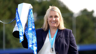 <p>Chelsea manager Emma Hayes celebrates with the FA Women's Super League trophy after clinching the title. Picture: John Walton</p>