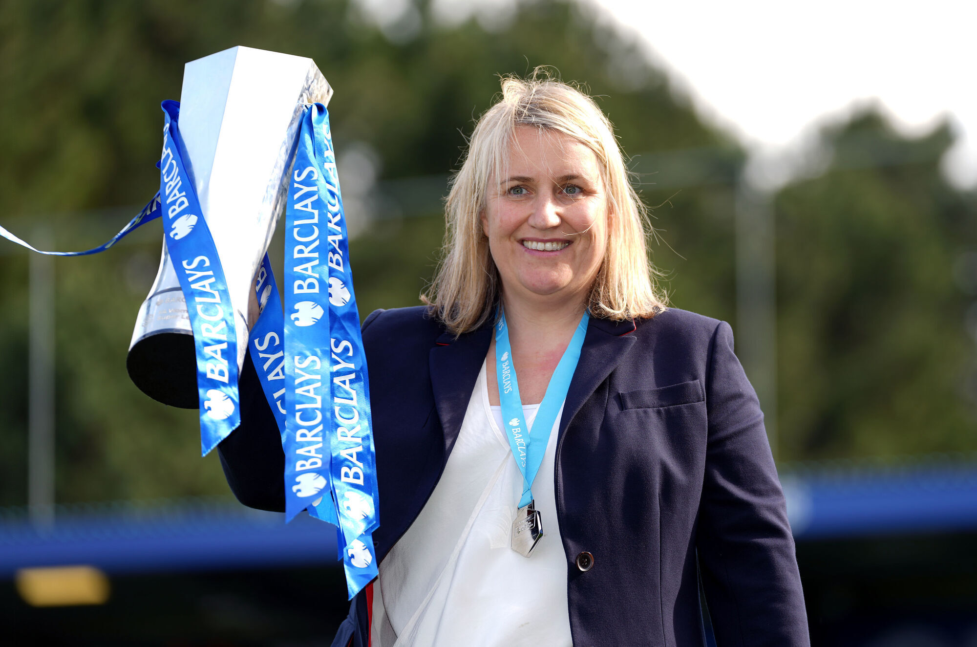 Chelsea manager Emma Hayes celebrates with the FA Women's Super League trophy after clinching the title. Picture: John Walton