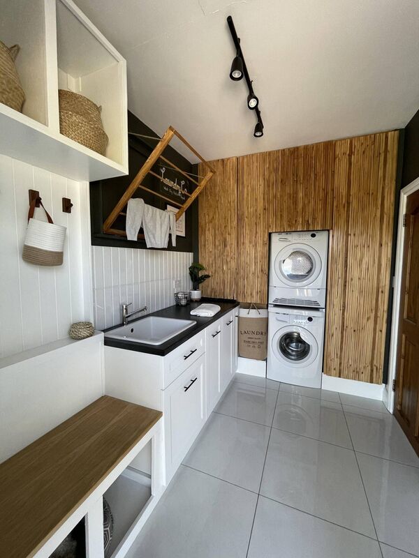 Shauna transformed her utility 'disaster zone' into a functioning laundry room