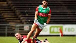 <p>Mayo’s Tommy Conroy celebrates scoring the first goal in Castlebar</p>