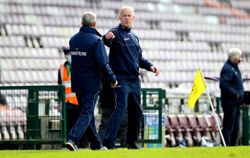 Limerick manager John Kiely with Galway manager Shane O'Neill after Sunday's game at Pearse Stadium. 