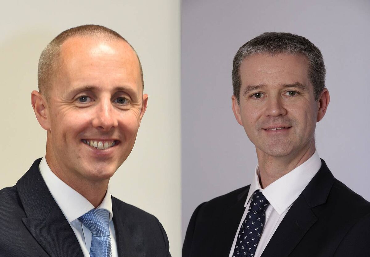 Éamon Dwyer of Invesco Cork and Miceál Gunning of Invesco Dublin. 