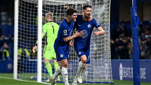 <p>Chelsea's Jorginho (left) celebrates scoring their side's second in the win over Leicester City</p>