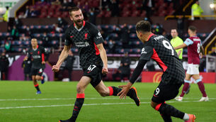<p>Liverpool's Nathaniel Phillips celebrates scoring the second goal of the 3-0 success over Burnley.</p>