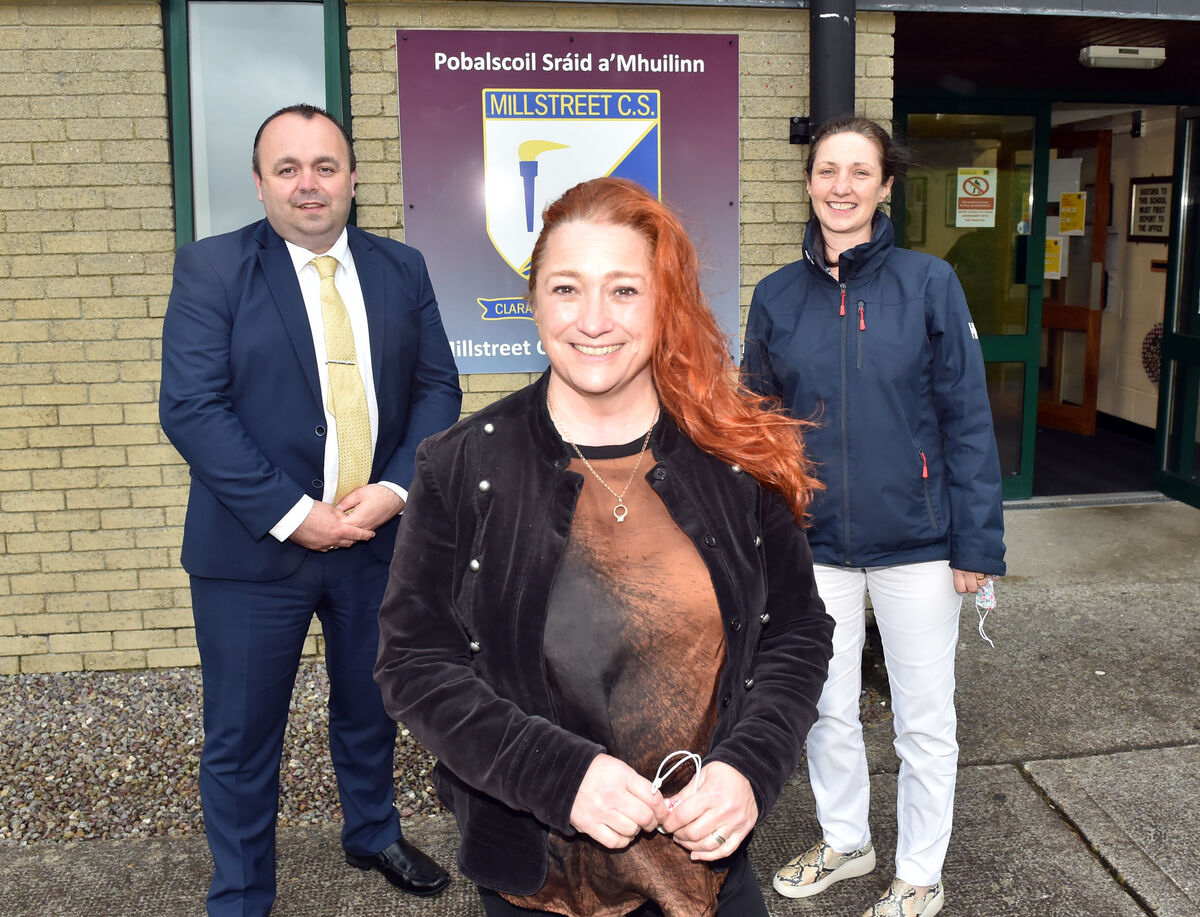 Niamh Kavanagh with Pól Ó Síodhcháin, principal. and deputy principal Frances Moynihan. Picture: Eddie O'Hare