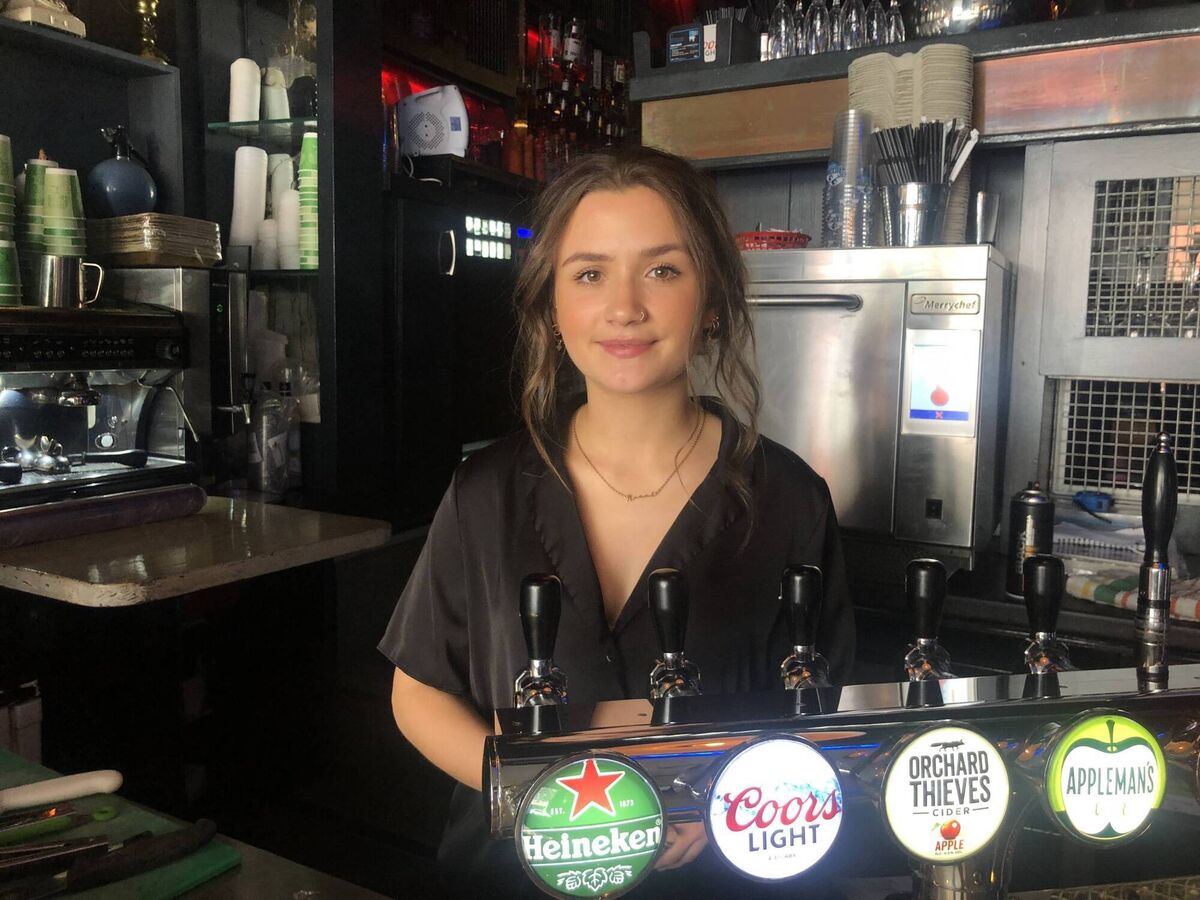 UL masters student and bar manager at the Red Hen Bar in Limerick Niamh Mulrooney says she is looking forward to opening back up for work for the first time this year. Picture: Caitlín Griffin
