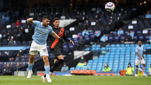 <p>Manchester City's Sergio Aguero scores their side's fifth goal at the Etihad Stadium. Picture: Carl Recine/PA</p>