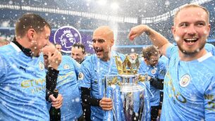 <p>Pep Guardiola leads the Manchester City title celebrations at the Etihad Stadium following their 5-0 win against Everton. Picture: Michael Regan/Getty Images</p>