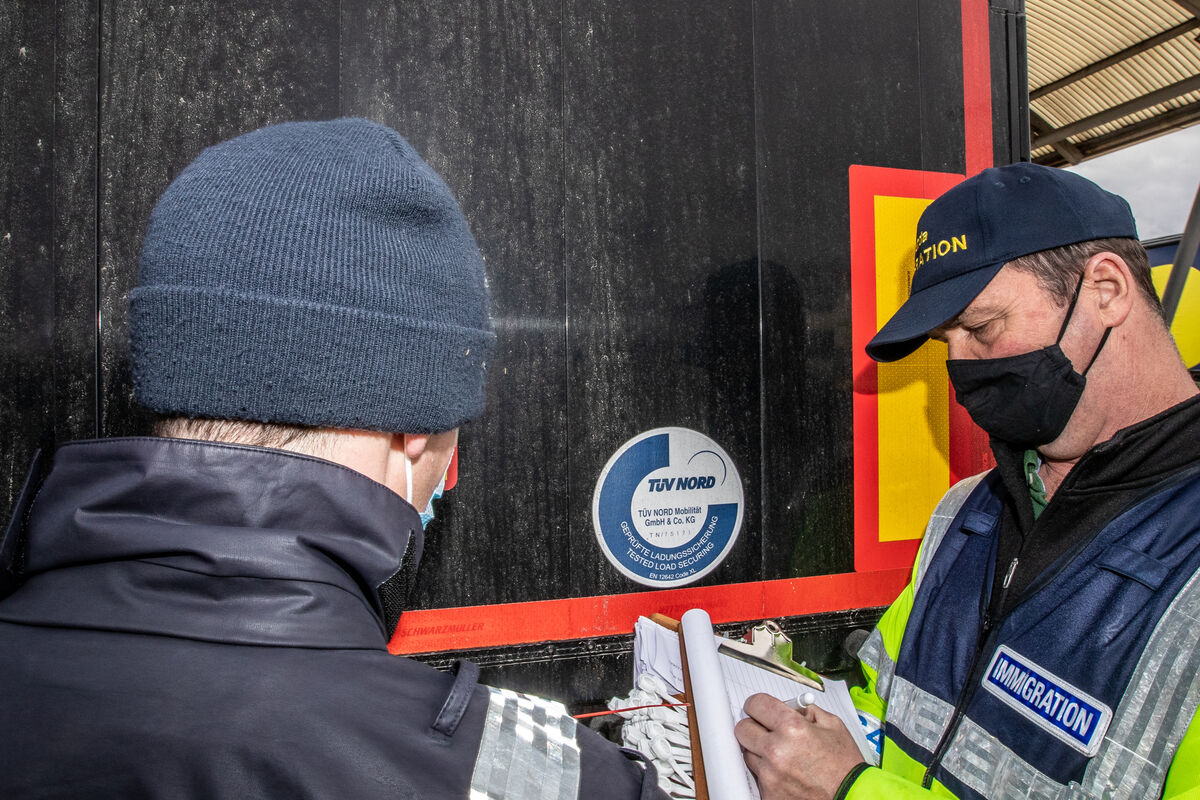 Sergeant Mick Morrissey inspecting the tag on the back of a trailer before his officers search it at Rosslare Euro Port, Co Wexford. Picture: Neil Michael Sergeant Mick Morrissey inspecting the tag on the back of a trailer before his officers search it at Rosslare Euro Port, Co Wexford. Picture: Neil Michael