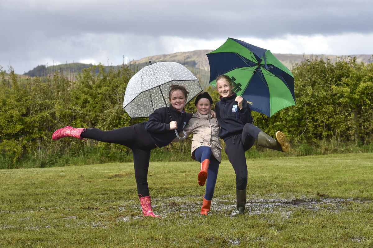 Meteorologists are pointing to a wet start to June. Pictured bracing this month's weather are Scoil Chúil Aodha pupils Colleen De Búrca, Caoimhe Ní Mhaoilchiaráin, and Eithne Ní Laocha. Picture: Dan Linehan Meteorologists are pointing to a wet start to June. Pictured bracing this month's weather are Scoil Chúil Aodha pupils Colleen De Búrca, Caoimhe Ní Mhaoilchiaráin, and Eithne Ní Laocha. Picture: Dan Linehan
