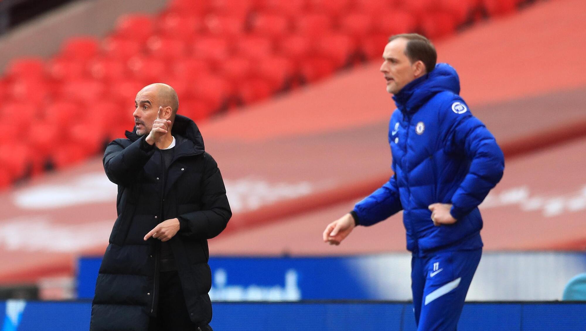 File photo dated 17-04-2021 of Manchester City manager Pep Guardiola (left) and Chelsea manager Thomas Tuchel (right) on the touchline