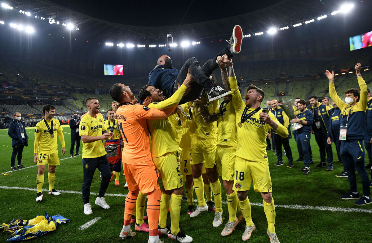 Former Villarreal footballer Santi Cazorla is thrown into the air in celebration after the UEFA Europa League final