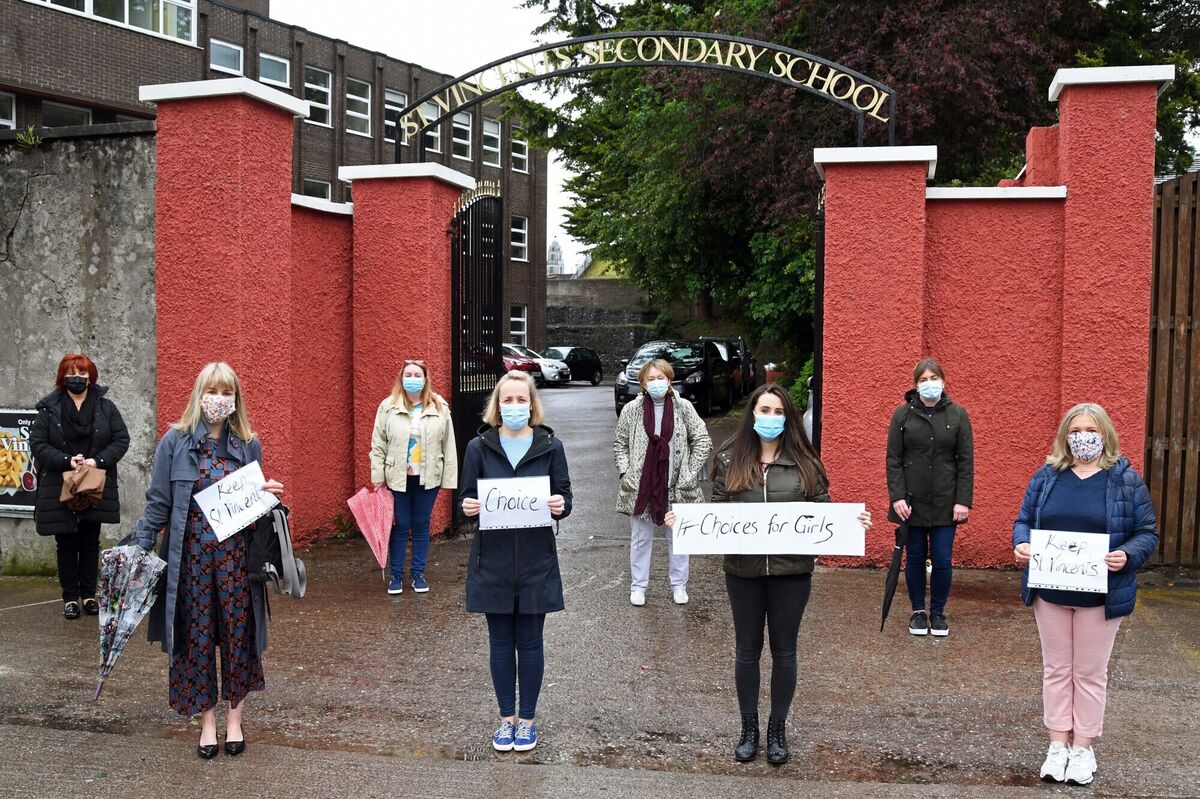 Some of the staff who joined parents and students at the protest outside the school. Photo: Denis Minihane