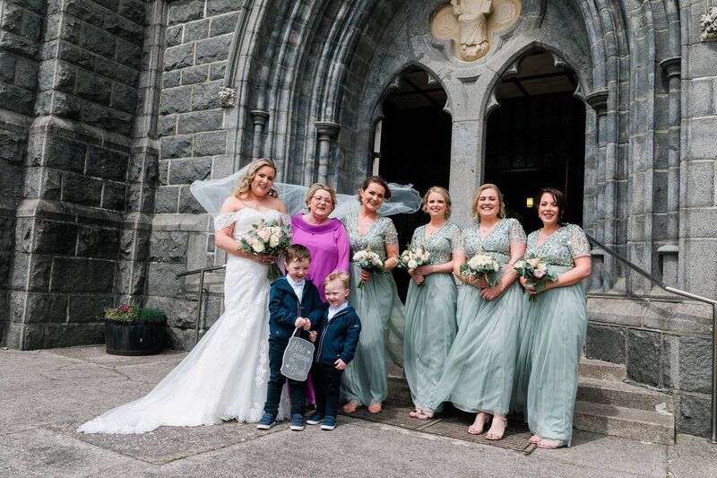 Andrea Lotty with her mother Mary, Siobhán Murphy, Gillian O’Mahony, Jennifer, and Jacob and Nathan Lotty were pageboys Andrea Lotty with her mother Mary, Siobhán Murphy, Gillian O’Mahony, Jennifer, and Jacob and Nathan Lotty were pageboys