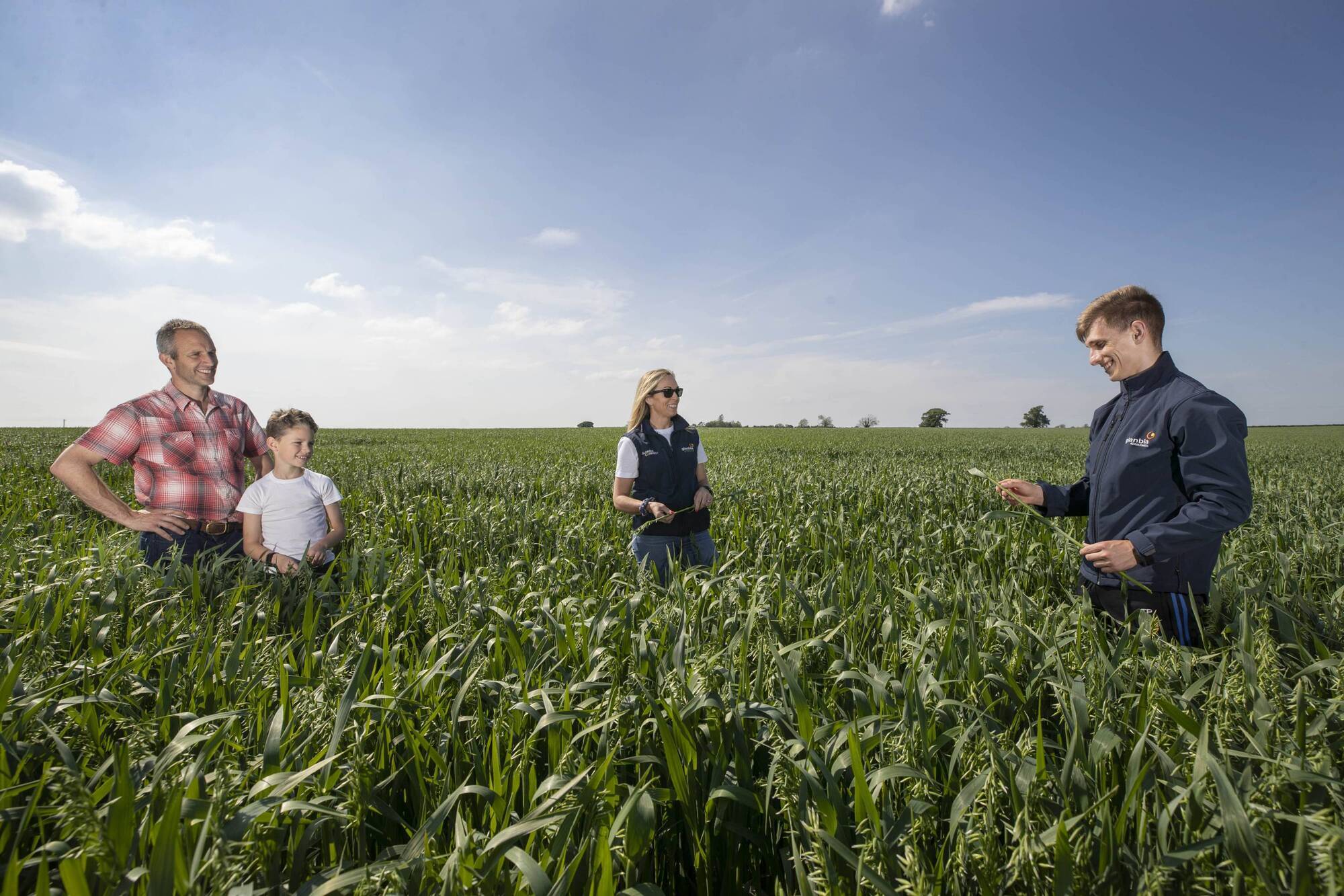 Glanbia Ireland carries out the final crop inspection of GFO at Jonny Greene’s farm in Meganey, Co, Kildare. Pictured L-R: Jonny Greene, son, Harry; Glanbia Ireland Grain Quality Operations Manager, Mariea O’Toole; and Glanbia Ireland Crop Inspector, Tom Pollard. Picture: Finbarr O’Rourke. 