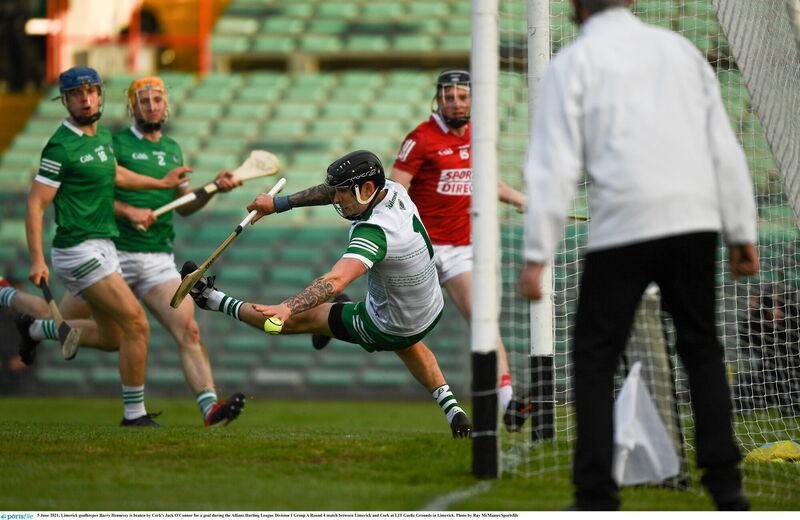 5 June 2021; Limerick goalkeeper Barry Hennessy is beaten by Cork's Jack O'Connor for a goal during the Allianz Hurling League Division 1 Group A Round 4 match between Limerick and Cork at LIT Gaelic Grounds in Limerick. Photo by Ray McManus/Sportsfile