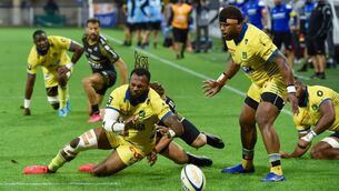 <p>Clermont's Fijian wing Alivereti Raka (L) misses to catch the ball during the French Top14 rugby union match between ASM Clermont and Stade Rochelais (La Rochelle) at Stade Marcel-Michelin in Clermont-Ferrand, central France  Photo by THIERRY ZOCCOLAN/AFP via Getty Images </p>