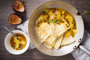 Coconut pancakes with passionfruit sauce