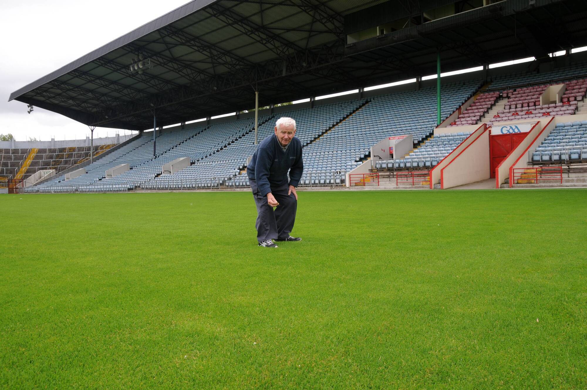 A LABOUR OF LOVE: Tommy Lynch checking up on the Pairc Ui Chaoimh pitch in the old stadium. Picture: George Hatchell