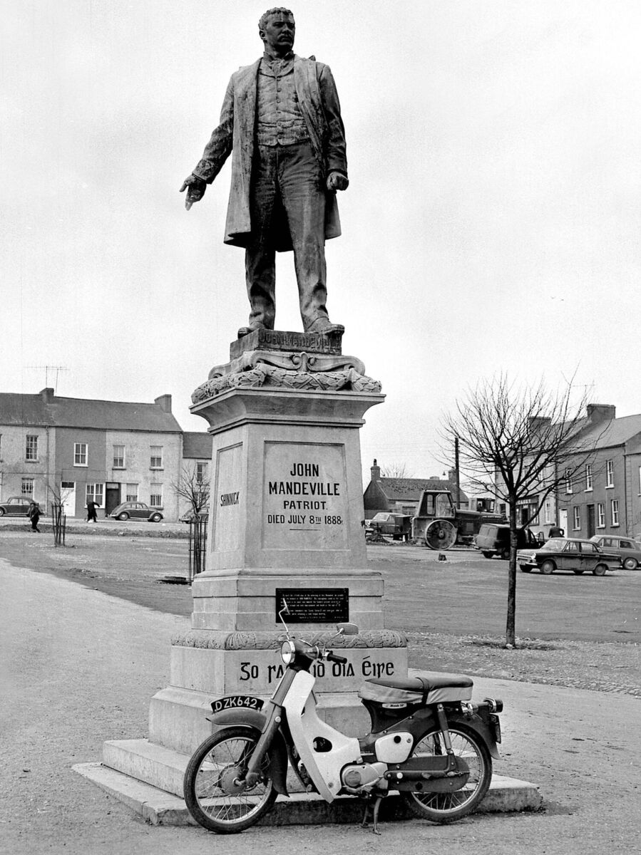 A Honda 50 parked by the statue of John Mandeville in 1968. Picture: Irish Examiner Archive 