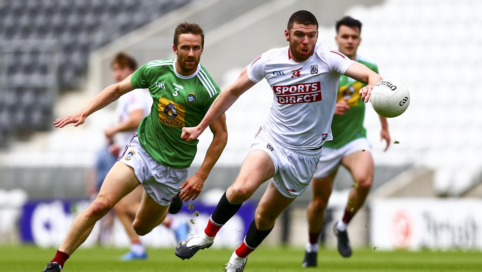 
                POWERING ON: Cork's Luke Connolly evades Kevin Maguire of Westmeath in this afternoon's Allianz Football League Division Two relegation play-off