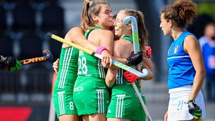 <p>Ireland's Nicola Evans and Deirdre Duke celebrate a goal in their 3-0 win over Italy</p>
