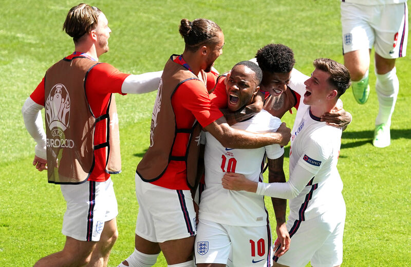 England's Raheem Sterling (centre) celebrates scoring their side's goal England's Raheem Sterling (centre) celebrates scoring their side's goal