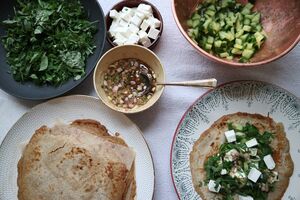 Oat pancakes with herb salad and dressing
