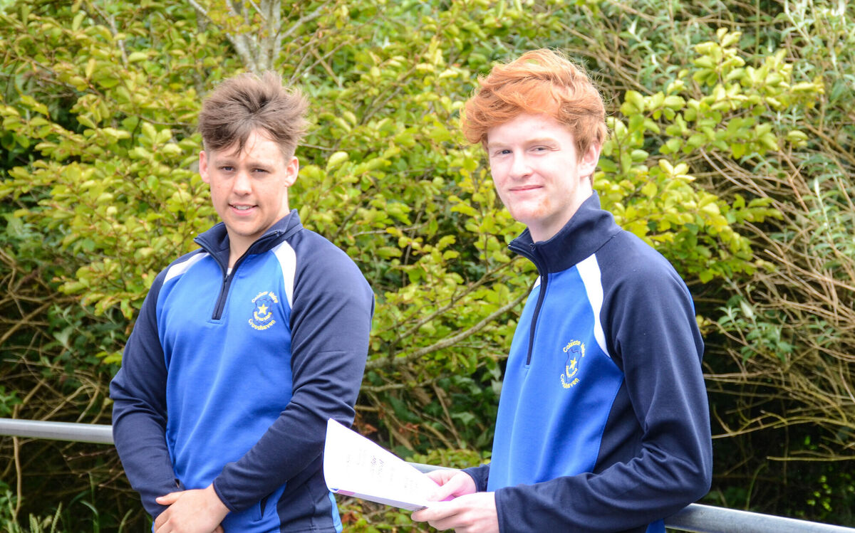 Conor O'Leary and Adam Power discuss Irish paper 2 at Coláiste Muire in Crosshaven. Picture: Howard Crowdy