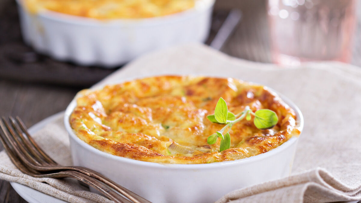 Cheese soufflé tart with summer herbs