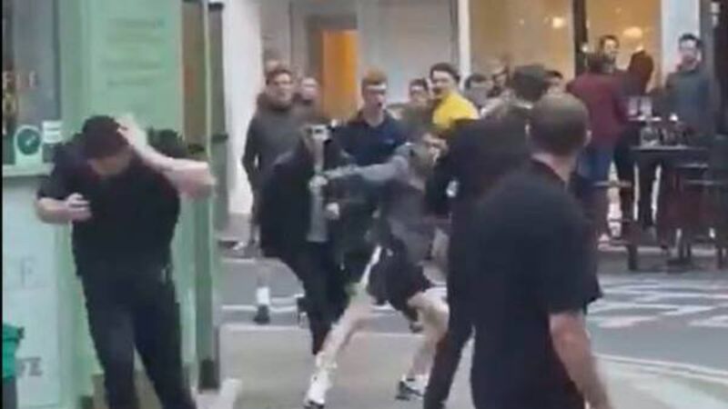 Three arrested after gang throws bottles at Dublin city bar staff