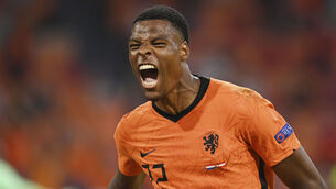 <p>Denzel Dumfries celebrates after scoring the Netherlands' second goal against Austria at the Johan Cruijff ArenA in Amsterdam. (John Thys, Pool via AP)</p>