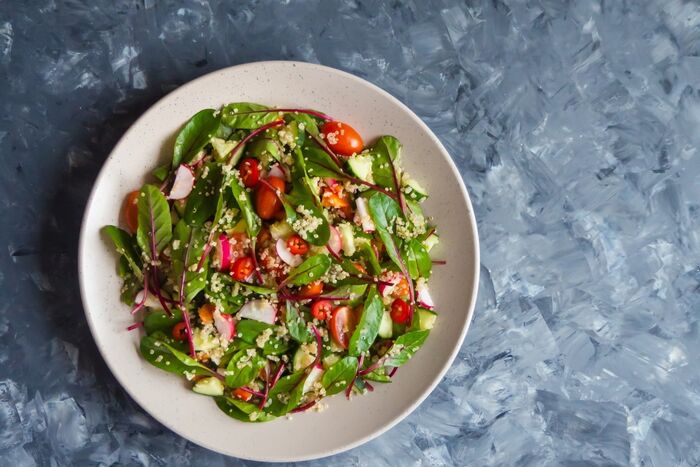 Chard with couscous, raisins and pine nuts