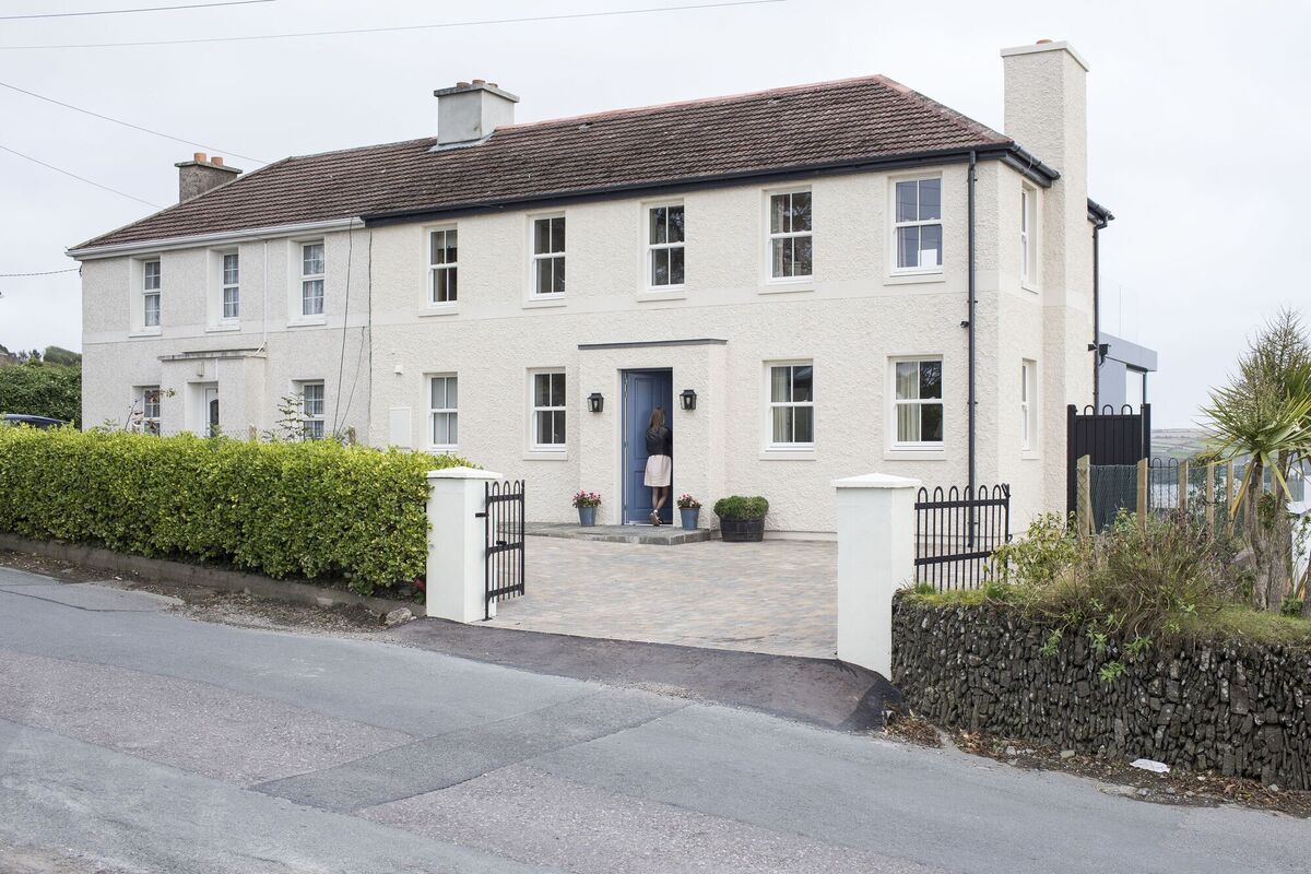  The extended front of this Kinsale house has been achieved with a design sympathetic to its semi-detached neighbour and its environment.
