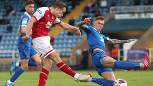 <p>Mattie Smith of St Patrick's Athletic has a shot on goal despite the attention of Kyle Ferguson of Waterford at the RSC. Photo by Michael P Ryan/Sportsfile</p>