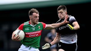 <p>DAZZLER: Darren McHale of Mayo fends off Sligo's Karl McKenna during the Connacht SFC quarter-final at Markievicz Park in Sligo. </p>