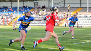 <p>Cork's Amy O'Connor on her way to scoring a goal, under pressure from Eimear Loughman of Tipperary. Picture: Jim Coughlan.</p>