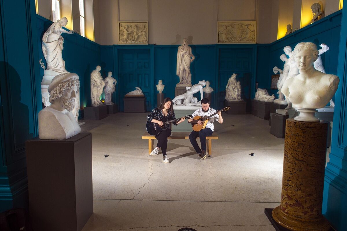 Traditional musicians Macdara Ó Faoláin and  Victoria Pierce, BMus students at MTU Cork School of Music (CSM), at Crawford Art Gallery to promote an online concert as part of the partnership between MTU CSM and Crawford Art Gallery. Picture: Michael Mac Sweeney/Provision
