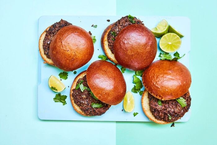 Chipotle mushroom and black bean burgers with peanuts and lime