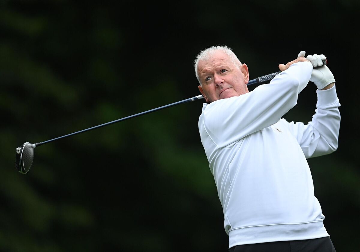 Gerry McIlroy, father of Rory McIlroy, watches his shot on the 4th hole. Photo by Ramsey Cardy/Sportsfile