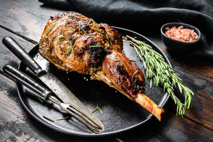 Butterflied leg of lamb with Harissa and chickpea salad