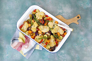 Parmesan pork with roast vegetables