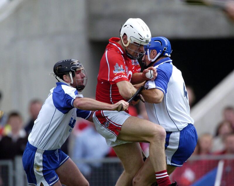 Timmy McCarthy, Cork, is tackled by Waterford players Tony Browne, left, and Declan Prendergast during the 2004 Munster Senior Hurling final. Picture: Ray McManus / SPORTSFILE