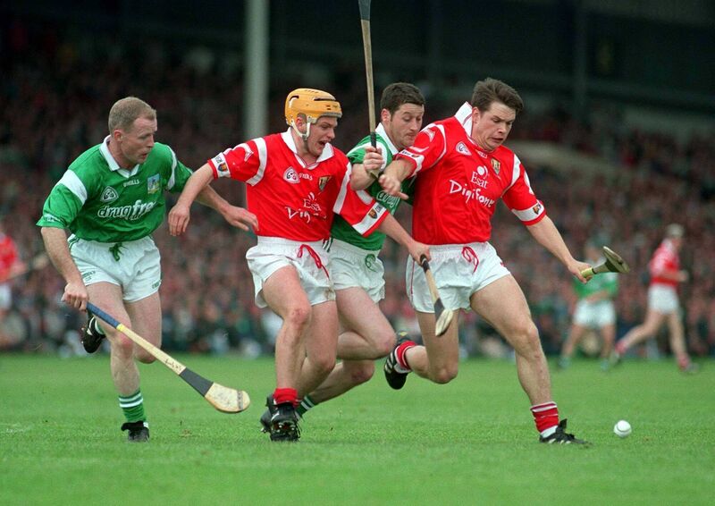 Steve McDonagh, Joe Deane, Pa Carey, and Alan Browne tussle in a 1998 clash between Limerick and Cork. It trails only Cork-Tipp as the most frequent Munster final pairing. Picture: Ray Lohan/Sportsfile
                    