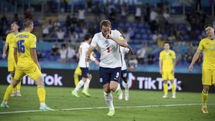 <p>England's Harry Kane celebrates after scoring his side's third goal during the Euro 2020 soccer championship quarterfinal match between Ukraine and England at the Olympic stadium in Rome, Saturday, July 3, 2021. (AP Photo/Ettore Ferrari, Pool)</p>