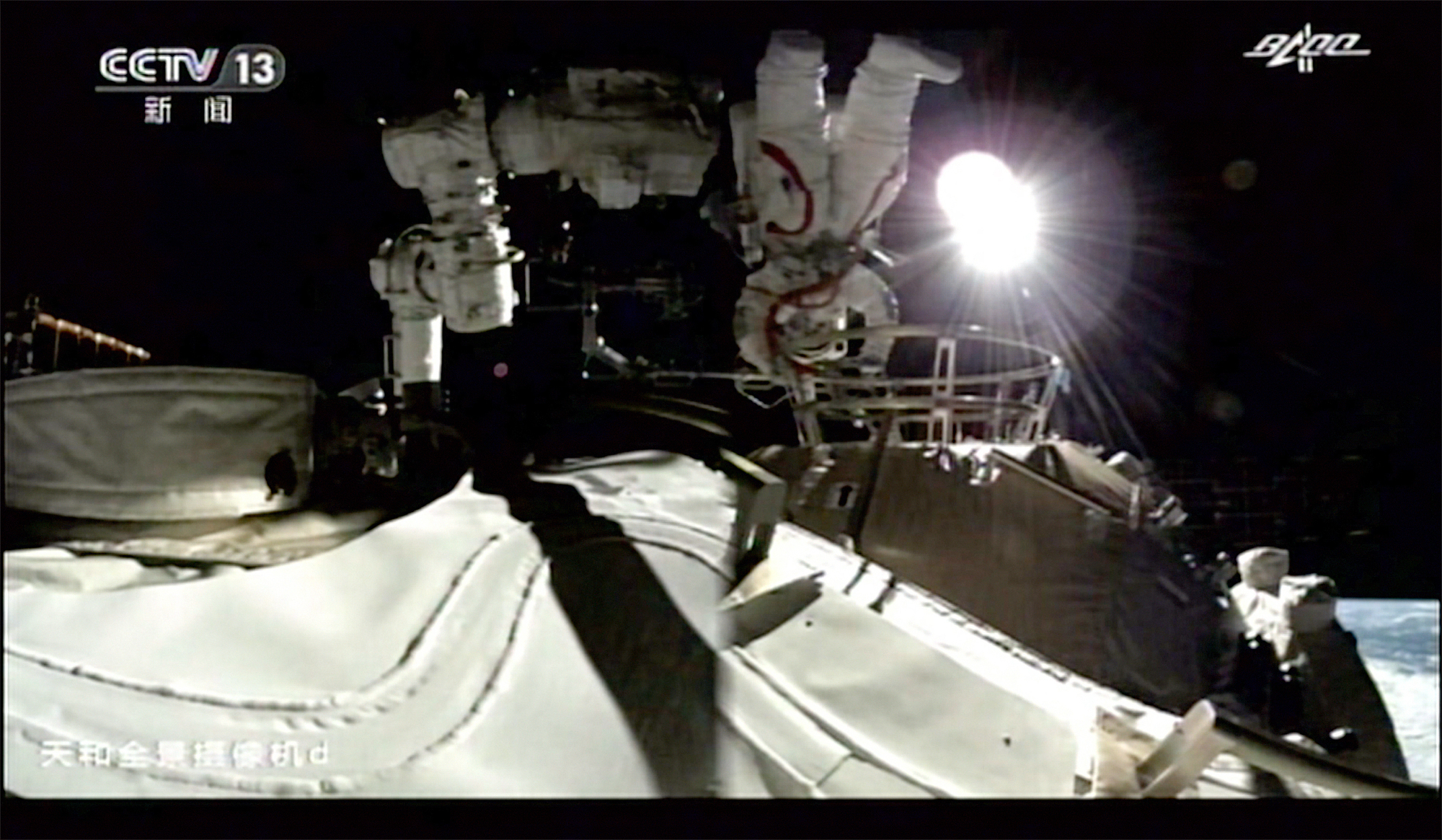 Chinese astronauts make first space walk outside new station