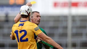 <p>YELLOW PERIL: Referee James Owen shows Aidan McCarthy a yellow card and awards a penalty after his foul on Tipperary’s Jake Morris, a controversial call that cost Clare dearly. 	<span class="contextmenu emphasis CaptionCredit">Picture: Inpho/Bryan Keane</span>
            </p>