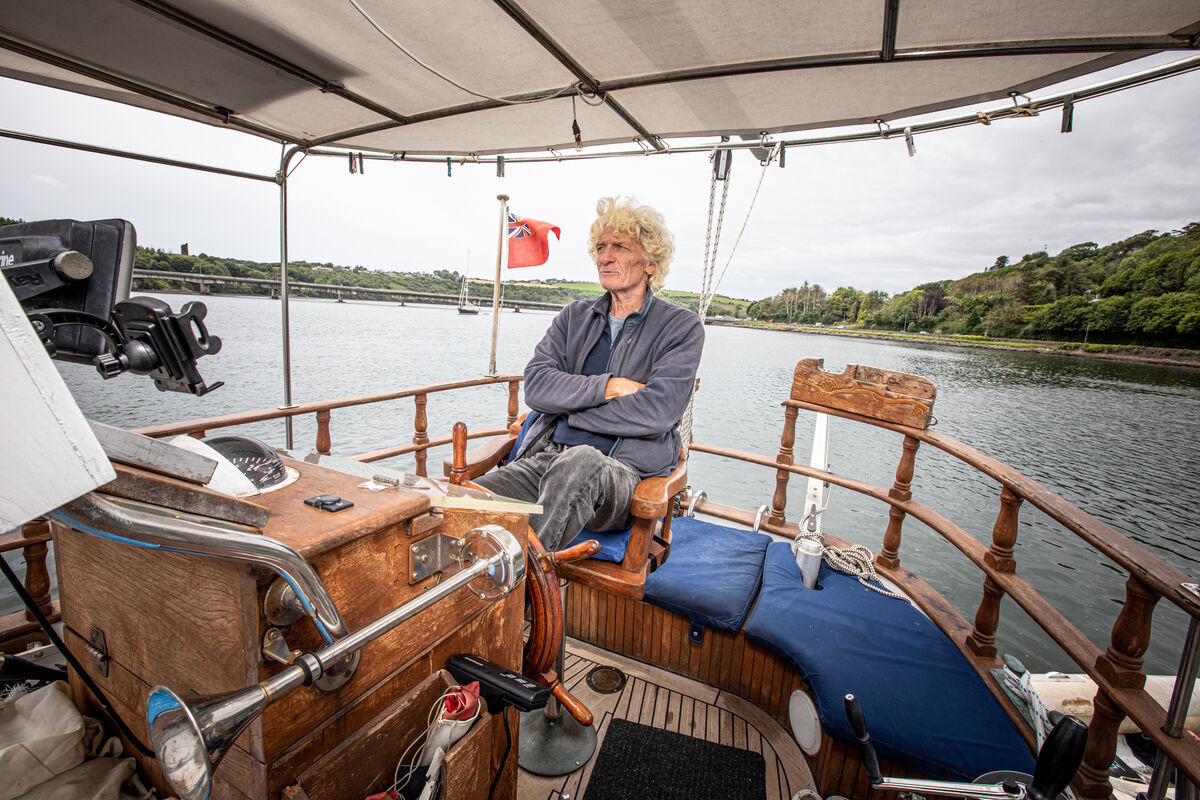 Former rock stage manager Pete Currier aboard his boat in Kinsale. Picture: Neil Michael