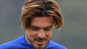 <p>England's midfielder Jack Grealish joins team-mates in a walk-about during an England training session at St George's Park in Burton-on-Trent in central England on June 30, 2021 during the UEFA EURO 2020 football championship. (Photo by JUSTIN TALLIS / AFP) (Photo by JUSTIN TALLIS/AFP via Getty Images)</p>