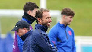 <p>Gary Neville has urged Gareth Southgate (pictured) and his side to ensure they do not become “nearly men”. Picture: Martin Rickett/PA</p>